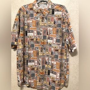 Multicolored  beautiful pattern. button up . Xl. Short sleeve.